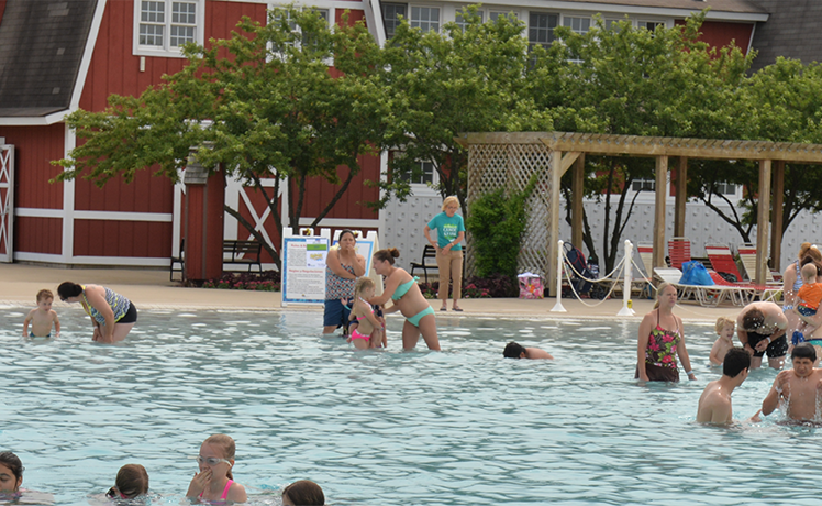 Crowd of people swimming at Splash Country Water Park